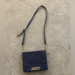 Dark blue juicy couture bag.